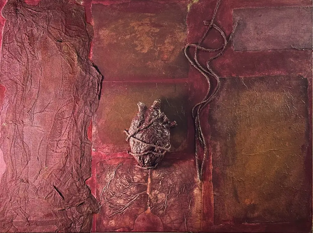 photo of love beat sculpture installed on canvas